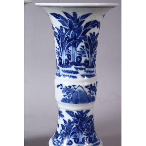 70 - A PAIR OF 19TH CENTURY OR LATER CHINESE BLUE & WHITE PORCELAIN GU VASES, The body of the vases decor... 