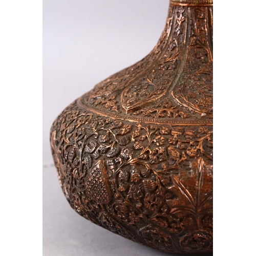 748 - A 19TH / 20TH CENTURY INDIAN KASHMIRI COPPER VASE, decorated with floral motif in relief, 29cm