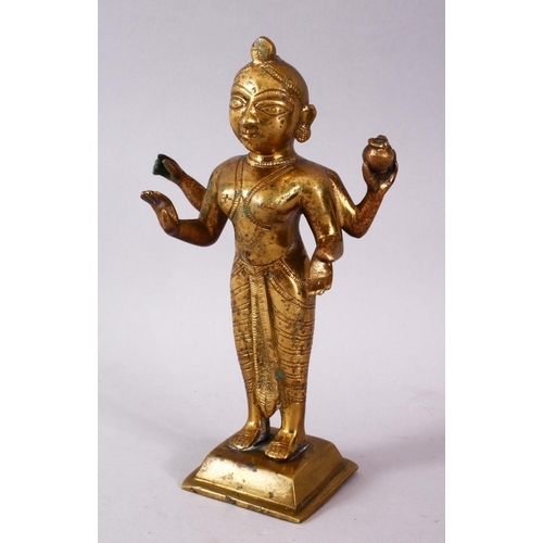 750 - A 19TH / 20TH CENTURY INDIAN BRONZE IGURE OF A DEITY, stood holding a vessel with plated hair, 20cm