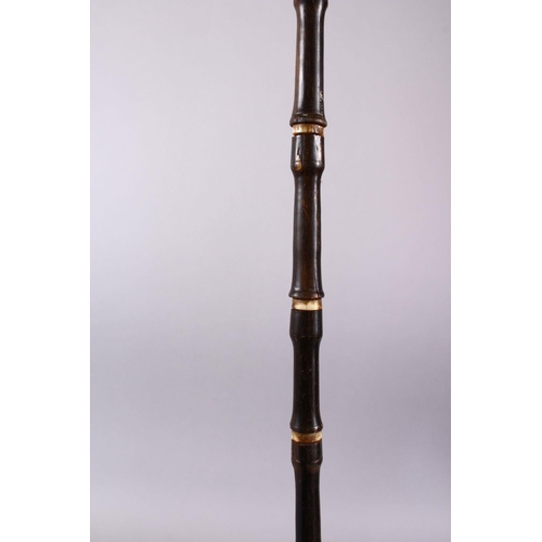 752 - AN 18TH CENTURY MUGHAL RHINO HORN AND BONE WALKING STICK, carved in section with Rhino horn and carv... 