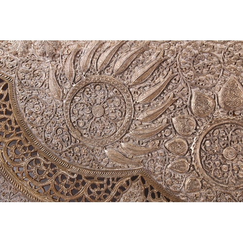 756 - A LARGE AND HEAVY 19TH CENTURY INDIAN SILVERED METAL RELIEF TRAY - FISH , decorated with raised nati... 