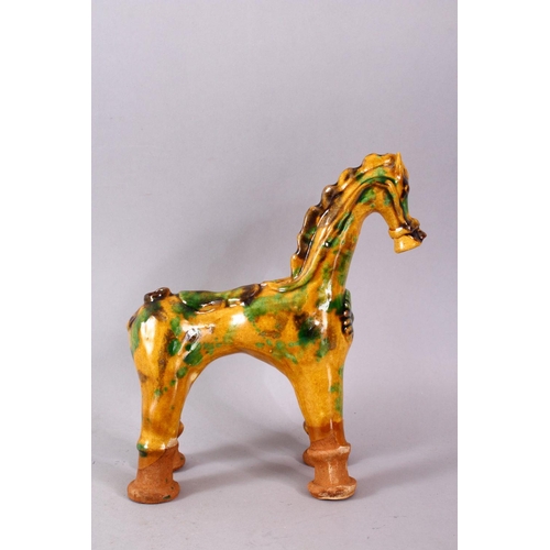 757 - A GOOD TURKISH CANNAKKALE POTTERY FIGURE OF A HORSE - OIL POURER, modeled as a stylized horse, with ... 