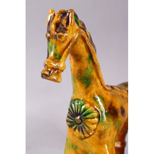 757 - A GOOD TURKISH CANNAKKALE POTTERY FIGURE OF A HORSE - OIL POURER, modeled as a stylized horse, with ... 