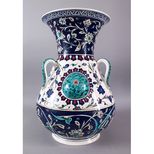 759 - A LARGE TURKISH OTTOMAN STYLE CERAMIC FLORAL LAMP VASE, with three moulded handles and three bosses,... 