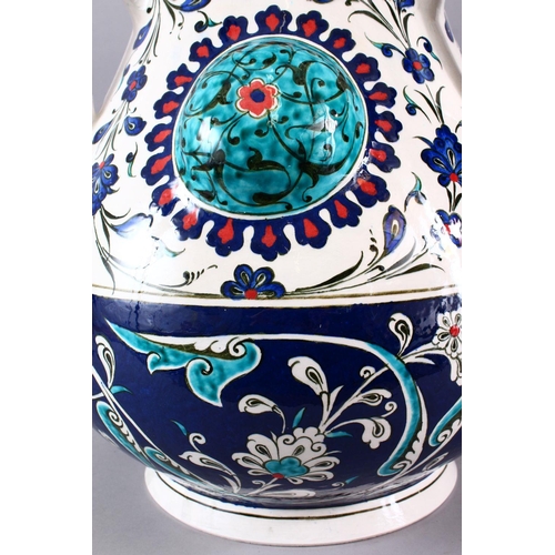 759 - A LARGE TURKISH OTTOMAN STYLE CERAMIC FLORAL LAMP VASE, with three moulded handles and three bosses,... 