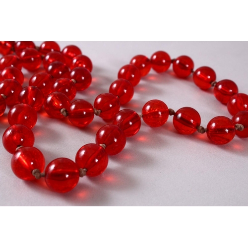 760 - A GOOD SET OF CHERRY AMBER ROSARY BEAD NECKLACE, with graduating bead size, approx open size 84cm.