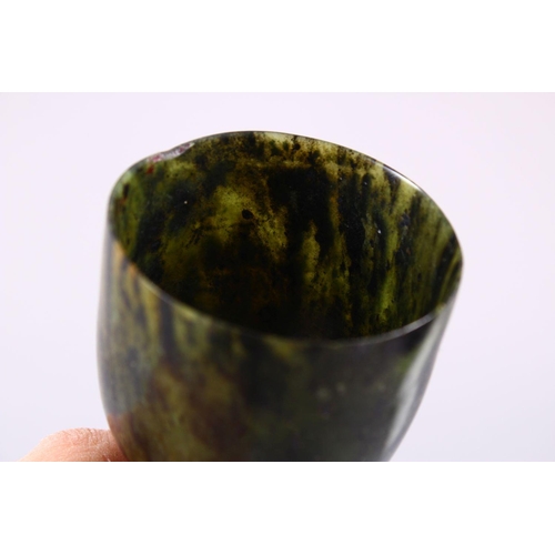 761 - A GOOD PAIR OF MUGHAL CARVED SPINACH GREEN JADE GOBLETS, 10cm high X 5.6cm diameter