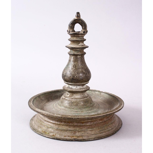 762 - A GOOD INDIAN BRONZE OIL LAMP, Signed and dated to the central section, 17cm high x 13.5cm diameter.