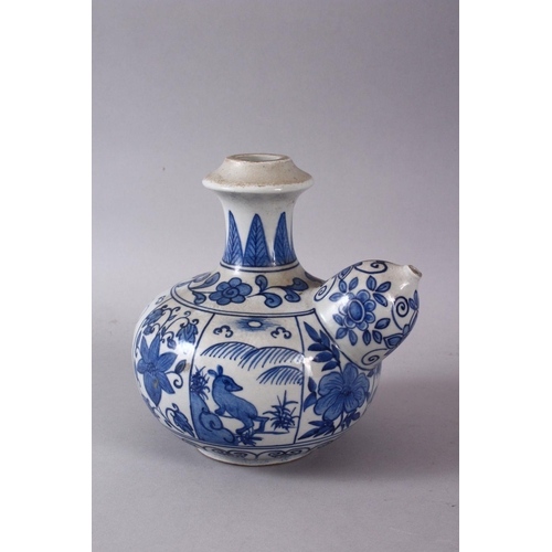 765 - A CHINESE BLUE & WHITE PORCELAIN POURING VESSEL - FOR THE ISLAMIC MARKET, decorated with panles of d... 