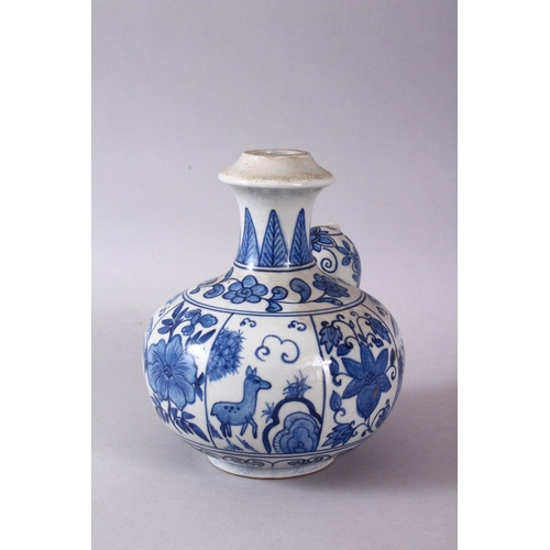 765 - A CHINESE BLUE & WHITE PORCELAIN POURING VESSEL - FOR THE ISLAMIC MARKET, decorated with panles of d... 