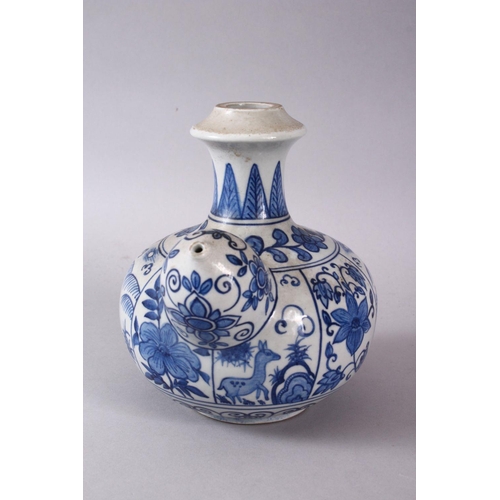 765 - A CHINESE BLUE & WHITE PORCELAIN POURING VESSEL - FOR THE ISLAMIC MARKET, decorated with panles of d... 