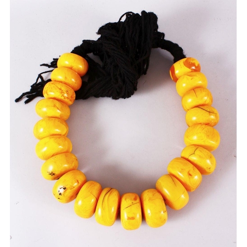 766 - A LARGE SET OF TURKISH? PRESSED AMBER BEAD NECKLACE, 20 beads, each bead approx. 5cm, overall approx... 