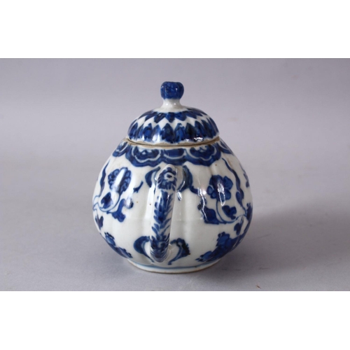 79 - A 19TH / 20TH CENTURY CHINESE BLUE & WHITE PORCELAIN TEAPOT, decorated with f lotus display, and flo... 