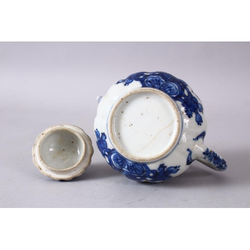 79 - A 19TH / 20TH CENTURY CHINESE BLUE & WHITE PORCELAIN TEAPOT, decorated with f lotus display, and flo... 