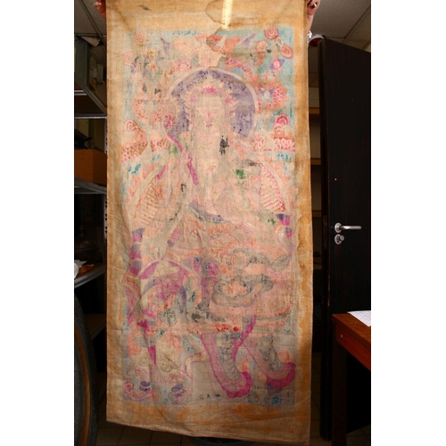 83 - A LARGE CHINESE PAINTED TEXTILE THANGKA, painted with scenes of a seated goddess with attendant, ver... 