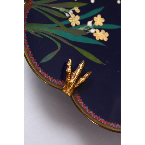 95 - A JAPANESE MEIJI PERIOD SILVER WIRE MOULDED PETAL FORM CLOISONNE DISH, depicting two birds in a cher... 