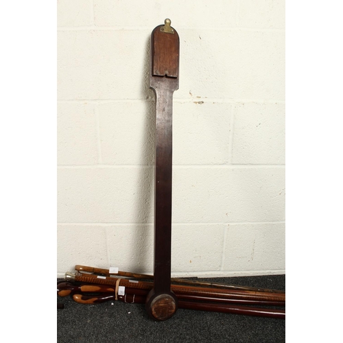 1266 - A GOOD STICK BAROMETER by WOODRUFF, MARGATE, with two ivory dials. 36ins long.
