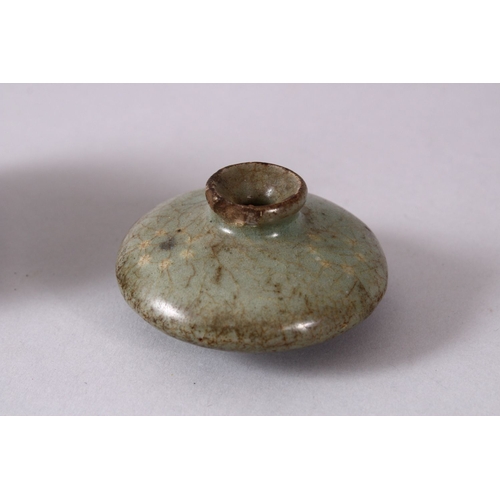 164A - TWO EARLY POSSIBLY 12TH CENTURY CHINESE CELADON CRACKLE GLAZED BRUSH WASHERS, both with a celadon gr... 