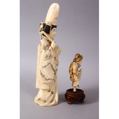 164H - TWO JAPANESE MIIJI PERIOD CARVED IVORY OKIMONOS, - the larger of a female karako actor with her drum... 