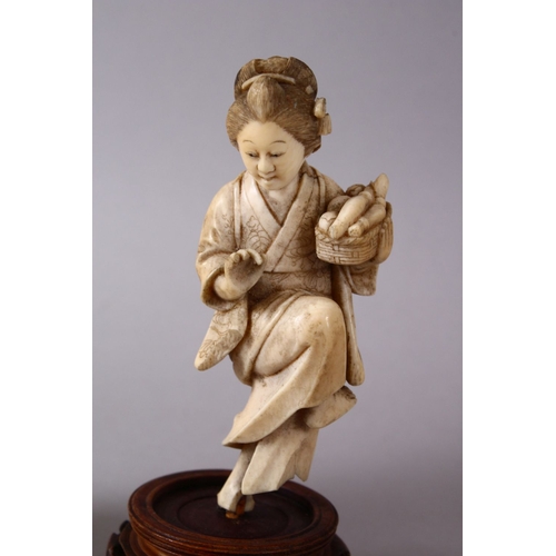 164H - TWO JAPANESE MIIJI PERIOD CARVED IVORY OKIMONOS, - the larger of a female karako actor with her drum... 