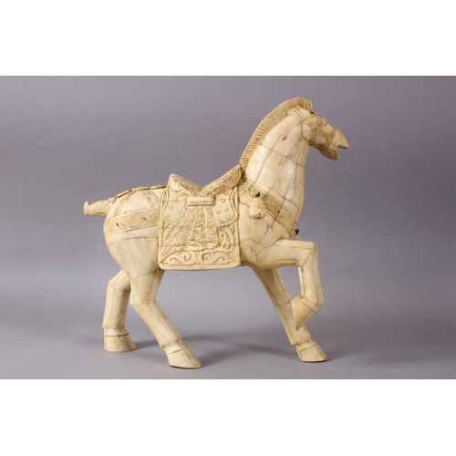 164I - A LARGE 19TH / 20TH CENTURY CHINESE CARVED SECTIONAL BONE FIGURE OF A TANG STYLE HORSE, stood in a s... 