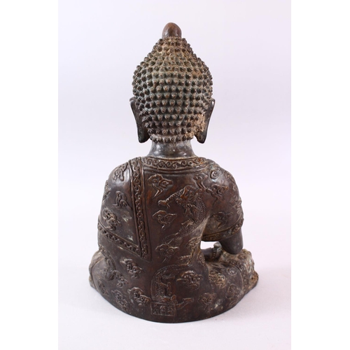 1 - A GOOD CHINESE BRONZE FIGURE OF SEATED BUDDHA, the body with raised decoration of dragons and styliz... 