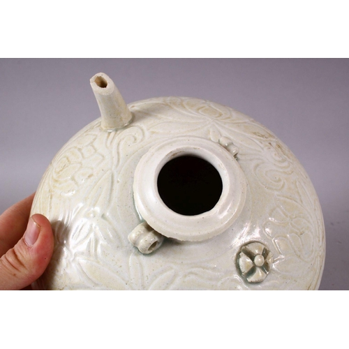114 - AN EARLY CHINESE POTTERY EWER OF FLATTEN CIRCULAR FORM, upper body incised with lotus flower decorat... 