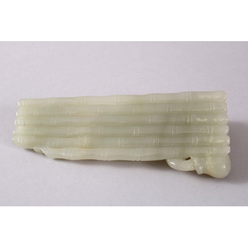 71 - A CHINESE CARVED CELADON JADE FIGURE OF A RECLINED IMMORTAL & FISH, the immortal figure reclined upo... 