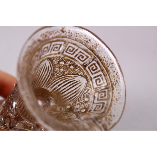 73 - A CHINESE ROCK CRYSTAL STYLE PEKING GLASS CARVED CUP, carved with archaic style, with a best emergin... 