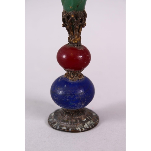 75 - A CHINESE CARVED HARD STONE FINIAL, 10.5CM
