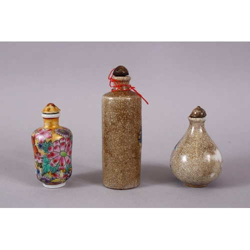 76 - THREE CHINESE PORCELAIN SNUFF BOTTLES, one of floral design, the other two with underglaze blue deco... 