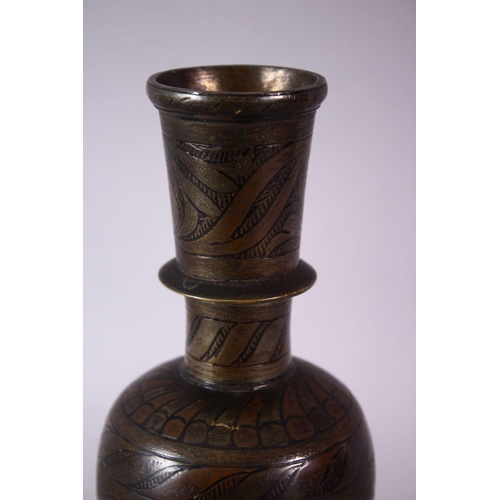 765 - AN ISLAMIC ENAMEL DECORATED BRASS HUQQA BASE, 23cm high.