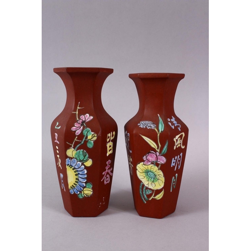 77 - A PAIR OF CHINESE ENAMEL YIXING CLAY HEXAGONAL VASES, the body with display of flora and calligraphy... 