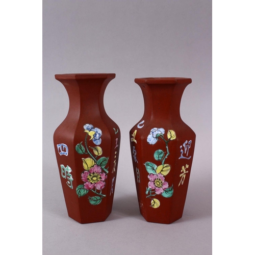 77 - A PAIR OF CHINESE ENAMEL YIXING CLAY HEXAGONAL VASES, the body with display of flora and calligraphy... 