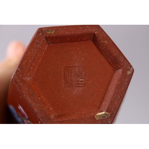 77 - A PAIR OF CHINESE ENAMEL YIXING CLAY HEXAGONAL VASES, the body with display of flora and calligraphy... 