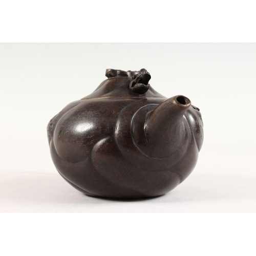 90 - A GOOD CHINESE YIXING CLAY DRAGON TEAPOT, the body of the pot with moulded dragon decoration, the fi... 