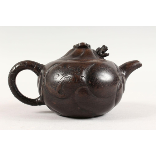 90 - A GOOD CHINESE YIXING CLAY DRAGON TEAPOT, the body of the pot with moulded dragon decoration, the fi... 