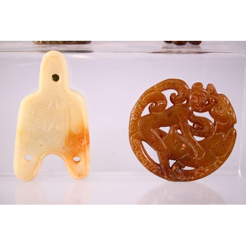 93 - A MIXED LOT OF EIGHT CARVED CHINESE JADE ITEMS, consisting of: A carved jade chilong belt hook, 9cm,... 
