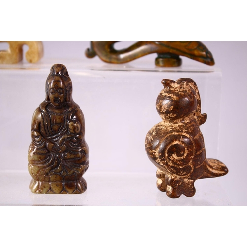 93 - A MIXED LOT OF EIGHT CARVED CHINESE JADE ITEMS, consisting of: A carved jade chilong belt hook, 9cm,... 