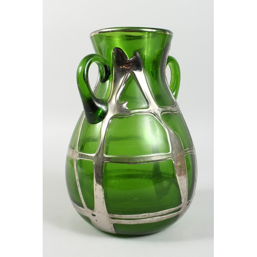 11 - A GOOD LOETZ STYLE GREEN GLASS TWO HANDLED VASE with silver mounts, 10 in. high.