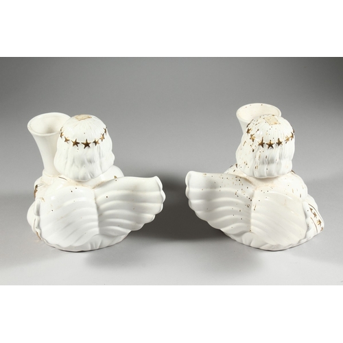 22 - A PAIR OF GILDED ANGEL SPILL VASES, 6 in. high.