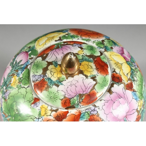 24 - A CHINESE MILLEFIORI GINGER JAR AND COVER, 8 in. high.