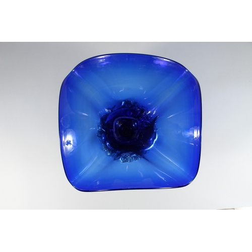 27 - A BLUE LARGE GLASS SQUARED CENTREPIECE on a silvered  base, 13 in.