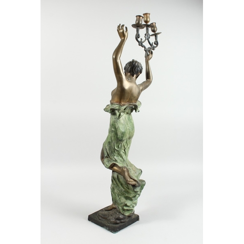 36 - A CLASSICAL BRONZE FEMALE holding three scrolling candle branches on a square base, 2 ft. 8 in. high... 