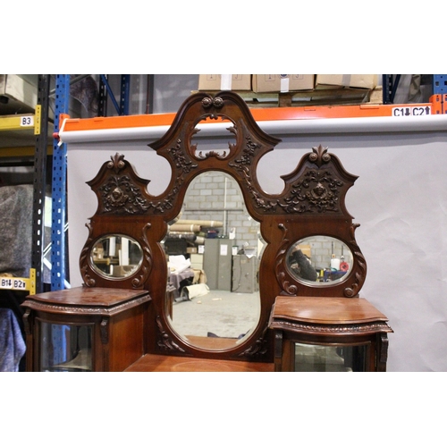 38 - A VICTORIAN MAHOGANY STANDING CHINA CABINET the top with three mirrored panels, on a base with bow f... 