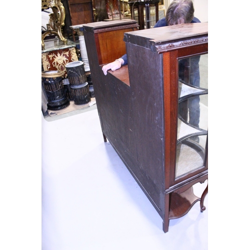 38 - A VICTORIAN MAHOGANY STANDING CHINA CABINET the top with three mirrored panels, on a base with bow f... 