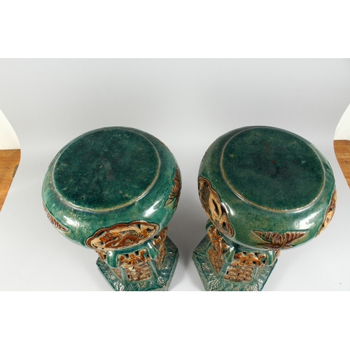 51 - A PAIR OF CHINESE POTTERY GARDEN SEATS (one AF) 18  in. high.