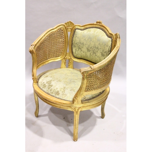 53 - A GOOD PAIR OF FRENCH GILDED BERGERE ARMCHAIRS WITH PADDED BACKS AND SEATS.