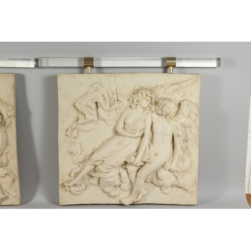 63 - A PAIR OF CLASSICAL MARBLE-TYPE PLAQUES, 17 in. x 17 in.