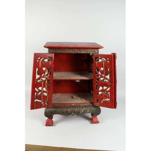 65 - A CHINESE LACQUERED CABINET with mosaic inlaid doors and pierced decoration, 2 ft. 2in. high.